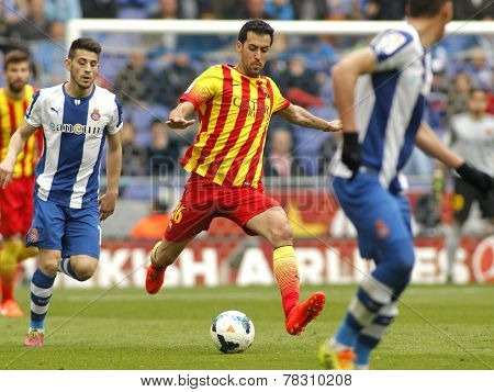 BARCELONA - MARCH, 29: Sergio Busquets of FC Barcelona in action during a Spanish League match against RCD Espanyol at the Estadi Cornella on March 29, 2014 in Barcelona, Spain