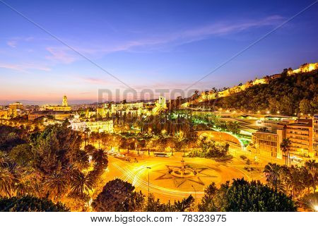 Malaga, Spain cityscape at the Cathedral, City Hall and Alcazaba Moorish fort.