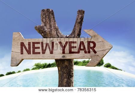 New Year sign with a beach on background