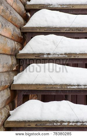 Powdery Snow Covered Old Wooden Stairs.