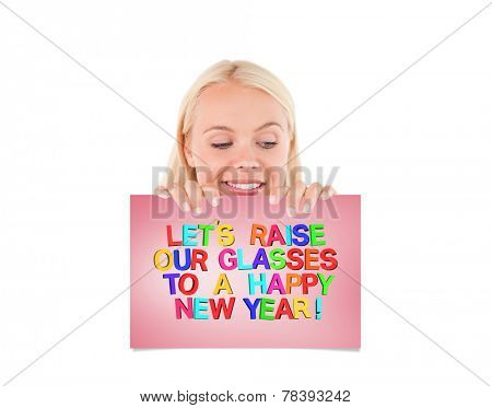 Woman peeking over a whiteboard against pink card
