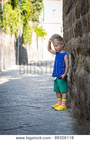 little boy in the coastal, Mediterranean city