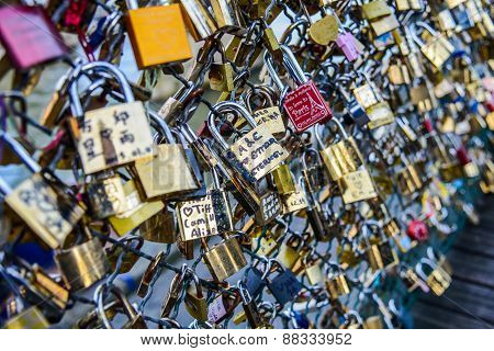 PARIS - January 1: Locks on Paris bridge near Seine river on January 1, 2015 in Paris, France.