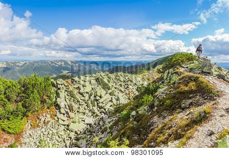 Mountain Autumn Landscape With Single Tourist On The Ridge