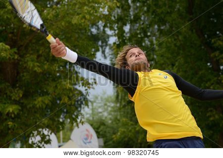 MOSCOW, RUSSIA - JULY 18, 2015: Vinicius Font of Brazil in the semifinal match of the ITF Beach Tennis World Team Championship against Russia. Russia won the match 2-1