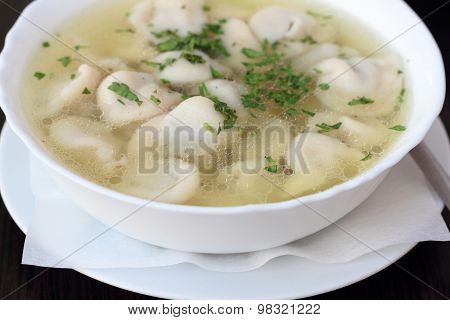 Broth with dumplings.