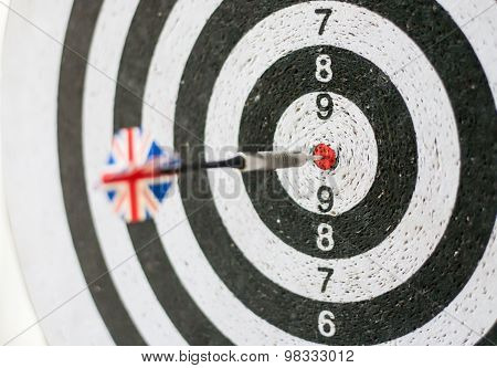 Darts board one Great Britain flag arrow