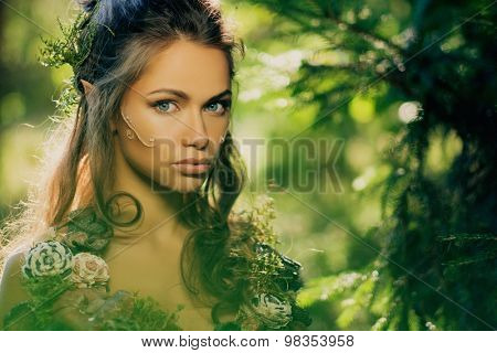 Elf woman in a magical forest