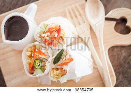 Fresh Spring Rolls On Wooden Table