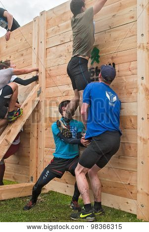 Teams Storm Wall In Extrim Race. Bastion Stage