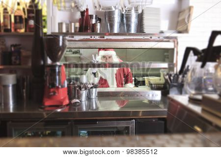Santa claus smiling in undustrial kitchen