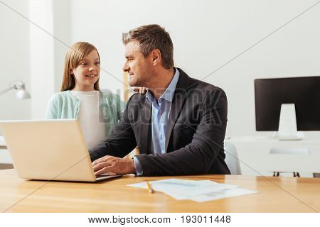 You can do that. Adventurous talented inspired girl spending the day with dad in his office while he working tirelessly and paying some minutes for talking to her