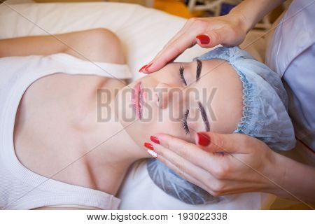 Cosmetology Doctor Makes Woman Treatments Facial Massage 1