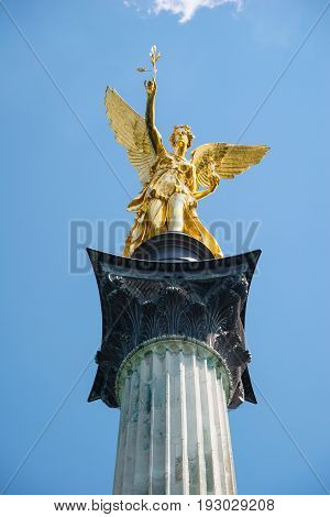 Monument And Golden Angel Of Peace In The Center Of The Capital Of Bavaria.
