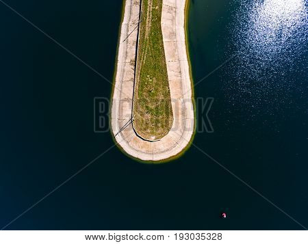 Aerial view breakwater at sea, cutwater, pier, groyne mole