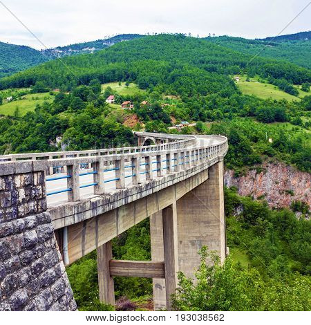 Mountain landscape Montenegro. Durdevica Tara arc bridge in the mountains
