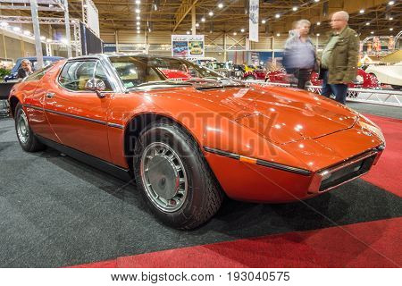 MAASTRICHT NETHERLANDS - JANUARY 15 2016: Mid-engined two-seat coupe Maserati Bora 1973. International Exhibition InterClassics & Topmobiel 2016