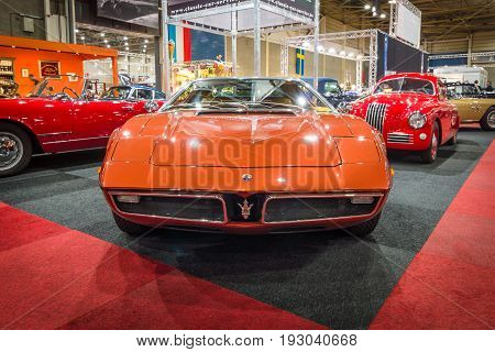 MAASTRICHT NETHERLANDS - JANUARY 15 2016: Mid-engined two-seat coupe Maserati Bora 1973. International Exhibition InterClassics & Topmobiel 2016