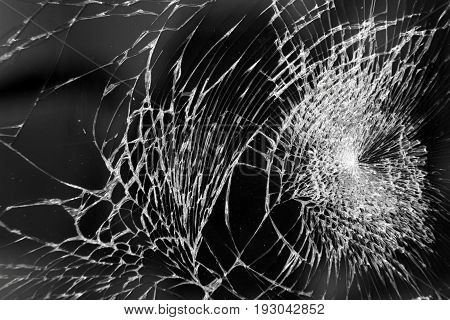 Broken glass on mobile phone, macro photo