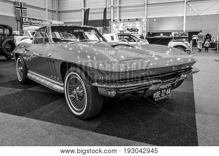 MAASTRICHT NETHERLANDS - JANUARY 15 2016: Sports car Chevrolet Corvette C2 