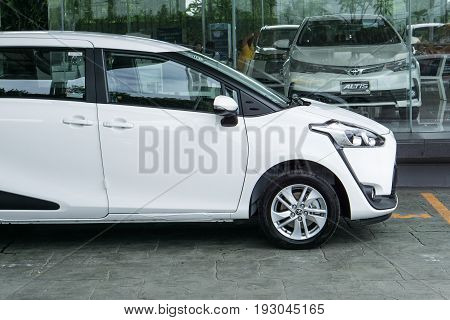 BANGKOK - JUNE 11: TOYOTA SIENTA white color on display at Toyota Buzz Ratchapruck branch Showroom car in Bangkok Thailand.