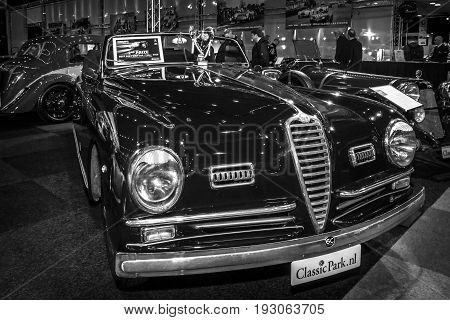 MAASTRICHT NETHERLANDS - JANUARY 15 2016: Sports car Alfa Romeo 6C 2500 SS Pinin Farina Cabriolet 1947. Black and white. International Exhibition InterClassics & Topmobiel 2016