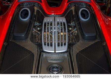 MAASTRICHT NETHERLANDS - JANUARY 15 2016: The engine compartment of a hypercar Porsche 918 Spyder. International Exhibition InterClassics & Topmobiel 2016