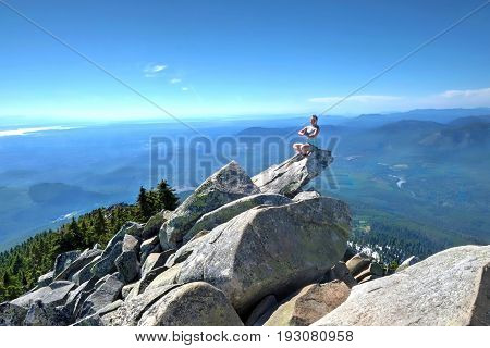 Meditation in mountains. Mount Pilchuck. Cascade Mountains.  Seattle. Washington. United States.