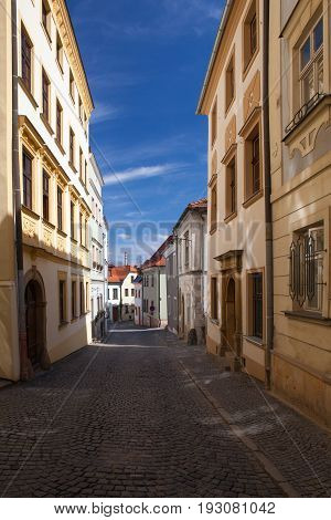 Empty street in Olomouc city in sunny day Czech Republic. Famous UNESCO heritage city and tourist attraction.