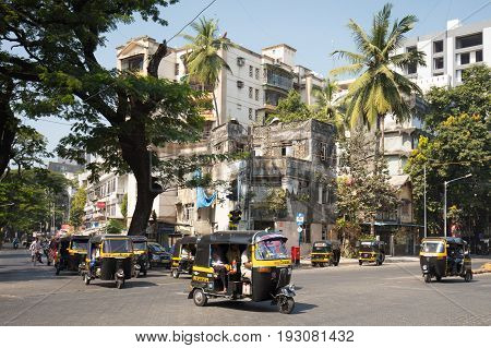 MUMBAI, INDIA - November 6 2017: Rickshaw traffic in Bandra on a hot summer's day in Mumbai, India