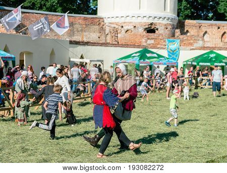 TROSTYANETS, UKRAINE - JUNE 25, 2017: Old Castle fest in action. Knights fight just beginning. This is 8 time traditional fest with historical costumes, foods and fights.
