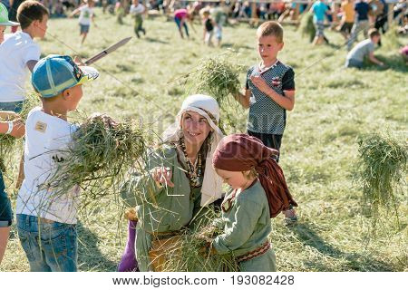 TROSTYANETS, UKRAINE - JUNE 25, 2017: Old Castle fest in action. Knights fight just beginning. This is 8 time traditional fest with historical costumes, foods and fights.