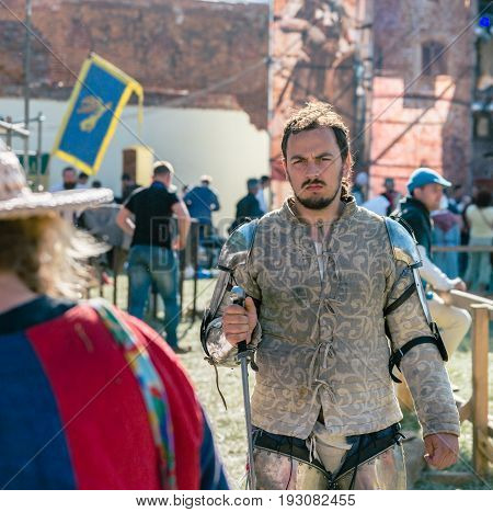 TROSTYANETS, UKRAINE - JUNE 25, 2017: Old Castle fest in action. Knights fight just beginning. This is 8 time traditional fest with historical costumes, foods and fights.