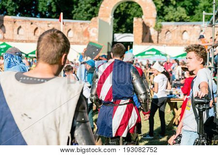 TROSTYANETS, UKRAINE - JUNE 25, 2017: Old Castle fest in action. Knights fight just beginning. This is 8 time traditional fest with historical costumes, foods and fights.