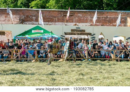 TROSTYANETS, UKRAINE - JUNE 25, 2017: Old Castle fest in action. Knights fight just beginning. This is 8 time traditional fest with historical costumes, foods and fights.