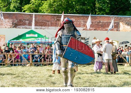 TROSTYANETS, UKRAINE - JUNE 25, 2017: Old Castle fest in action. Knights fight just beginning. This is 8 time traditional fest with historical costumes, foods and fights.