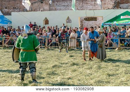 TROSTYANETS, UKRAINE - JUNE 25, 2017: Old Castle fest in action. Knights fight just beginning. This is 8 time traditional fest with historical costumes, foods and fights.