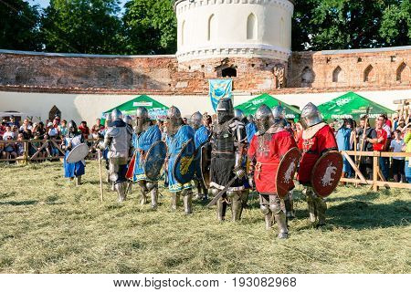 TROSTYANETS, UKRAINE - JUNE 25, 2017: Old Castle fest in action. Knights fight just beginning. This is 8 time traditional fest with historical costumes, foods and fights.