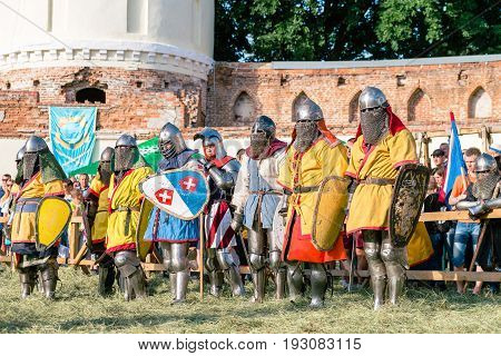 TROSTYANETS, UKRAINE - JUNE 25, 2017: Old Castle fest in action. Knights fight just beginning. This is 8 time traditional fest with historical costumes, foods and fights.