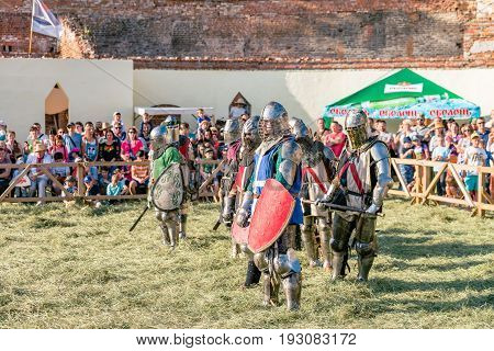 TROSTYANETS, UKRAINE - JUNE 25, 2017: Old Castle fest in action. Knights fight just beginning. This is 8 time traditional fest with historical costumes, foods and fights.