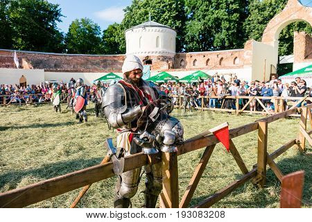 TROSTYANETS, UKRAINE - JUNE 25, 2017: Old Castle fest in action. Knights fight just beginning. This is 8 time traditional fest with historical costumes, foods and fights.