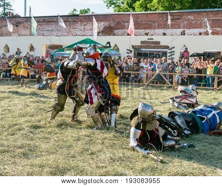 TROSTYANETS, UKRAINE - JUNE 25, 2017: Old Castle fest in action. Knights fight just beginning. This is 8 time traditional fest with historical costumes, foods and fights.