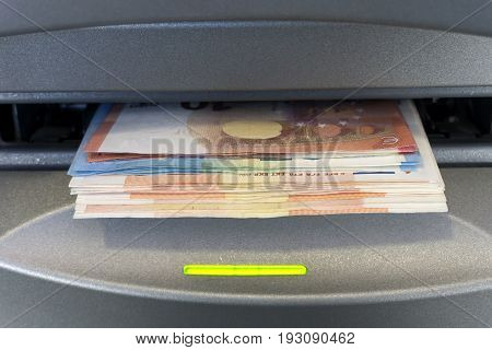 Cash Terminal in detail with eruo banknotes