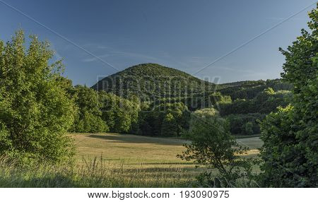 Evening in Ceske Stredohori mountains with Lipska hill