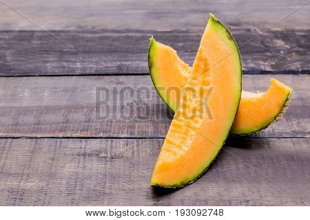 melon on wood table, fresh fruit from Japan