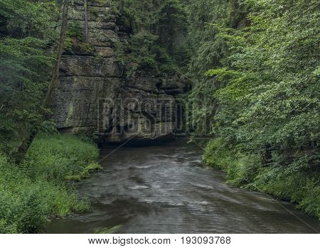 Dolsky mill in national park with old ruin of mill in north Bohemia