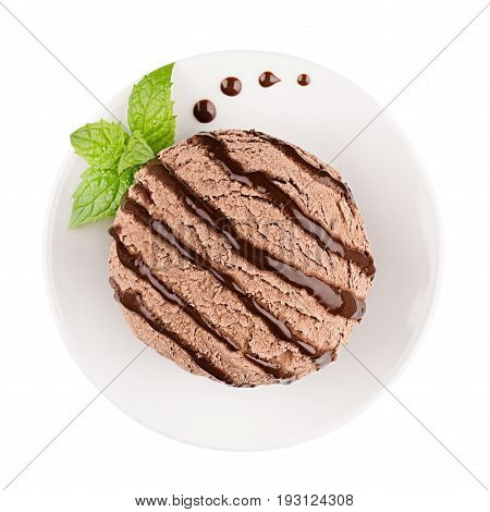Ice cream brown scoop on plate decorated mint leaves chocolate sauce top view isolated on white background.