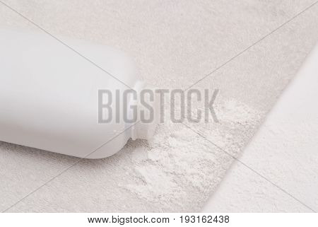 Talcum Powder On A Soft White Towel Background