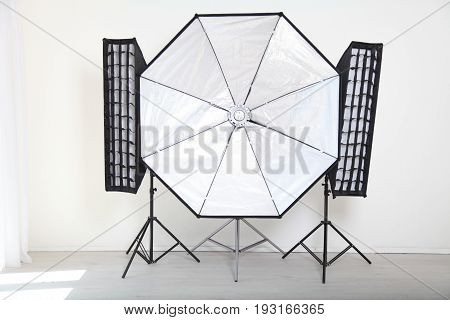 Flash On A White Background In The Photo Studio Softbox Equipment