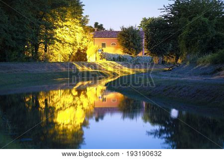 night landscape with the image of channel in Rovigo, Italy